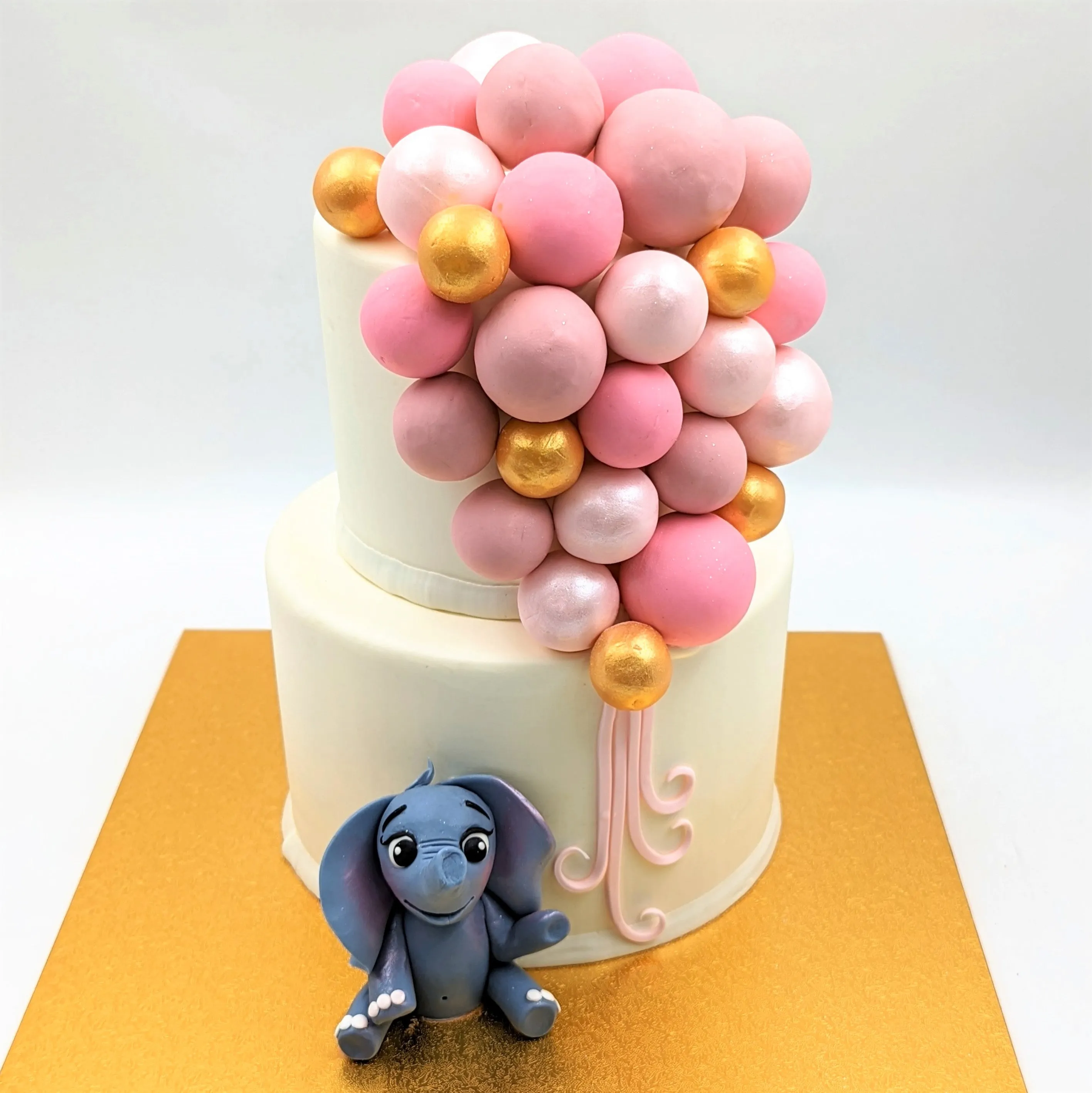 Tiered Balloon Cluster with Elephant